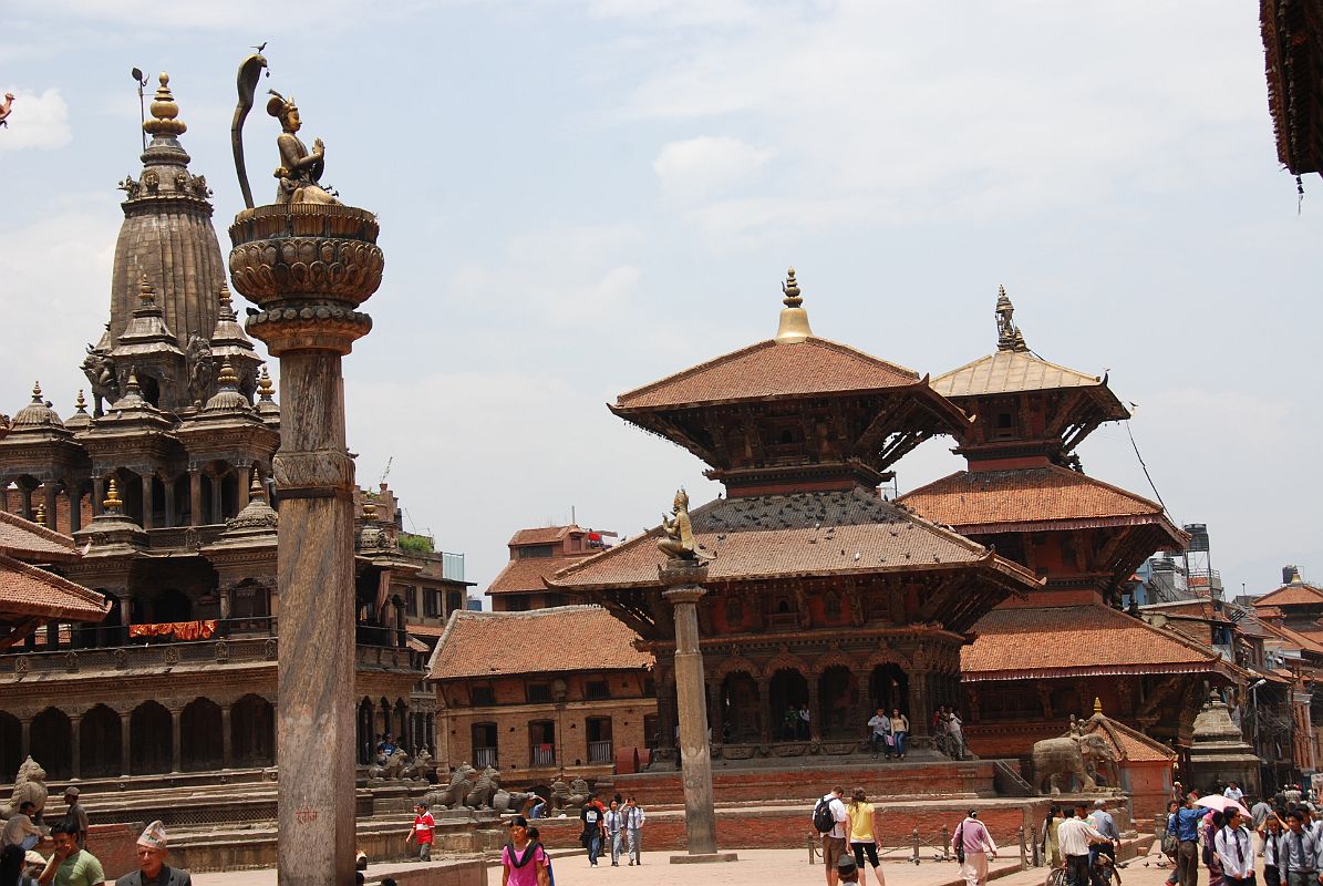 Kathmandu Patan Durbar Square 10 Krishna Mandir, King Yoganarendra Malla Column, Garuda Column, Vishwanath Temple, And Bhimsen Temple The Krishna Mandir temple, King Yoganarendra Malla column, Garuda column, Vishwanath Temple, and Bhimsen Temple occupy the west side of Patan�s Durbar Square. Vishwanath (Shiva) Temple (1627) is an elaborately decorated two-roofed temple with two stone elephants guarding the entrance. The Bhimsen Temple (1682) at the northern end of Durbar Square is a three-story temple dedicated to the god of trade and business.